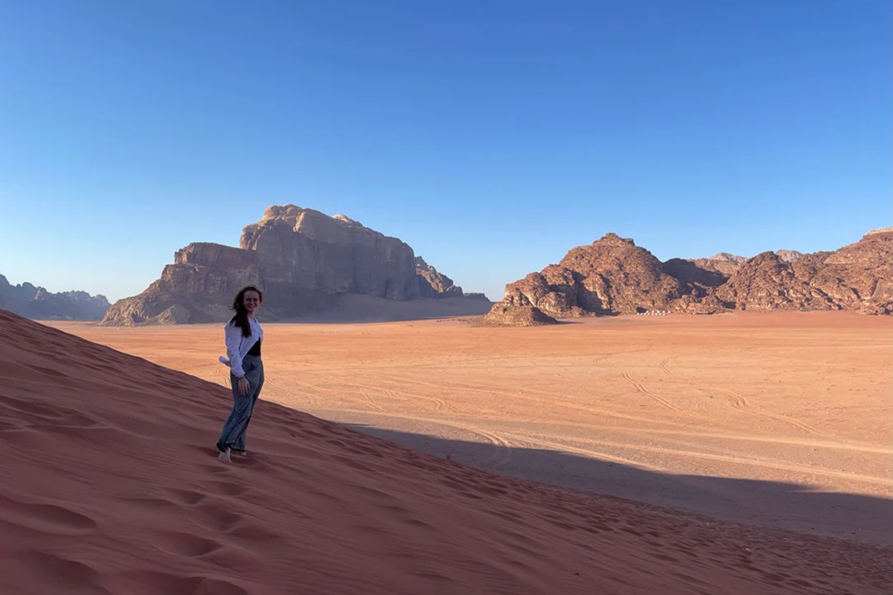 Charlotte Heeley standing in a mountainous desert