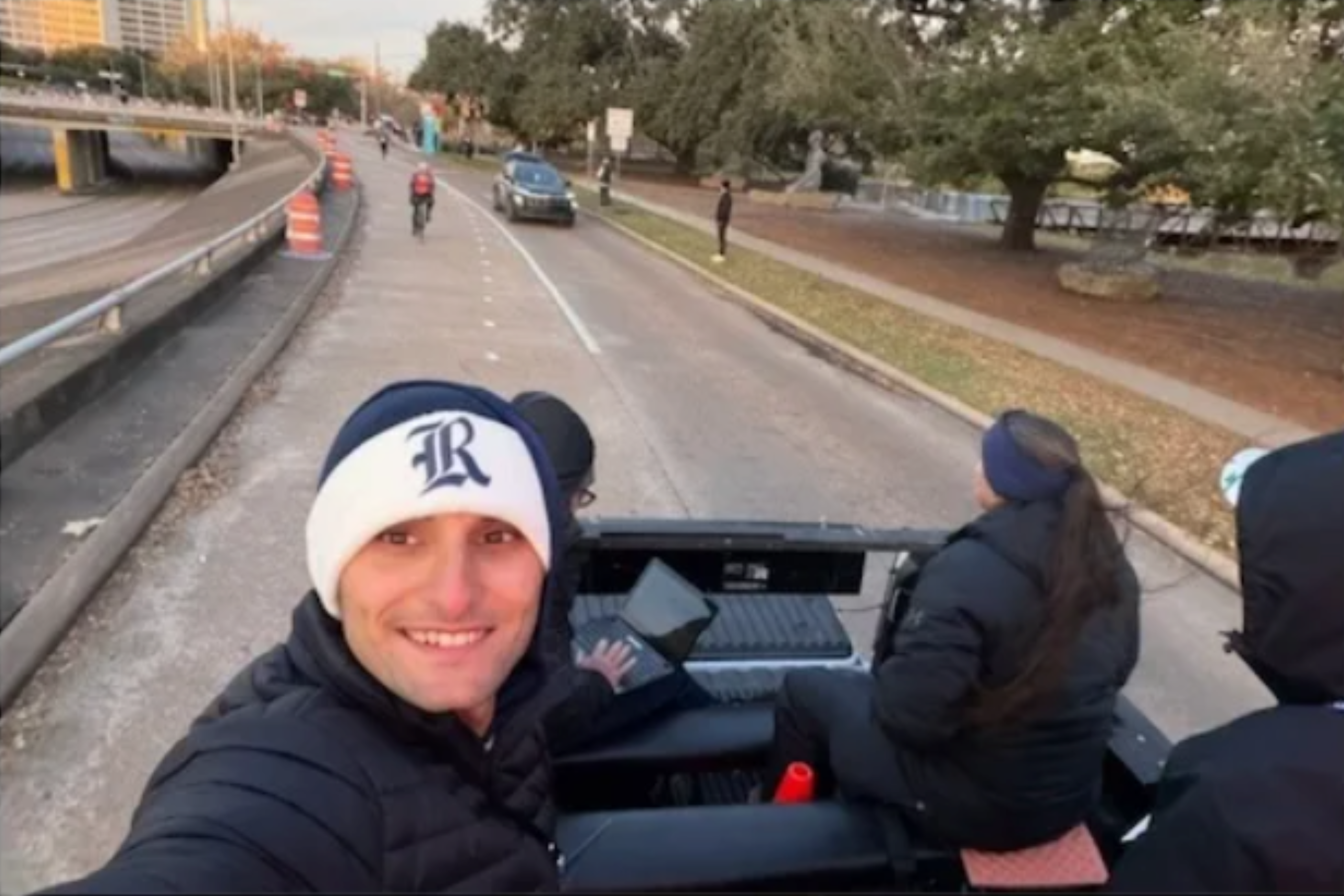 Jackson Moran in a car, Rice University Master of Social Policy Evaluation